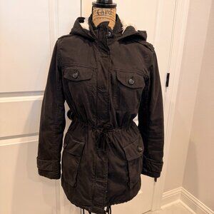 Aritzia Talula black utility jacket with a soft faux fur–lined interior